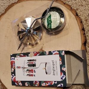 Pluto Anglaspel Rotary Candle Holder Santa Design NEW